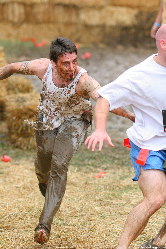A zombie chases a runner